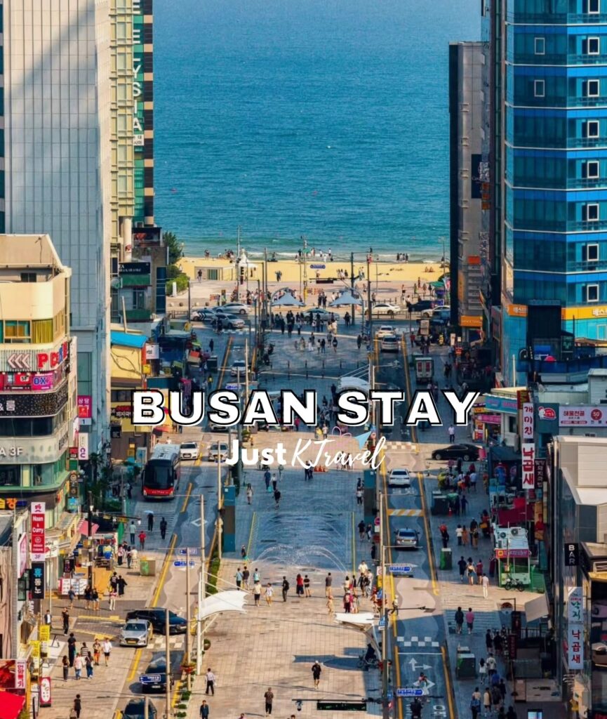 Aerial view of Haeundae Beach in Busan with coastline, city skyline, and ocean