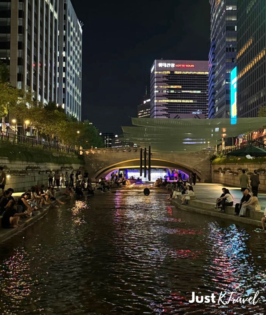 Cheonggyecheon Stream in Seoul with walking path and city view for first time visitors