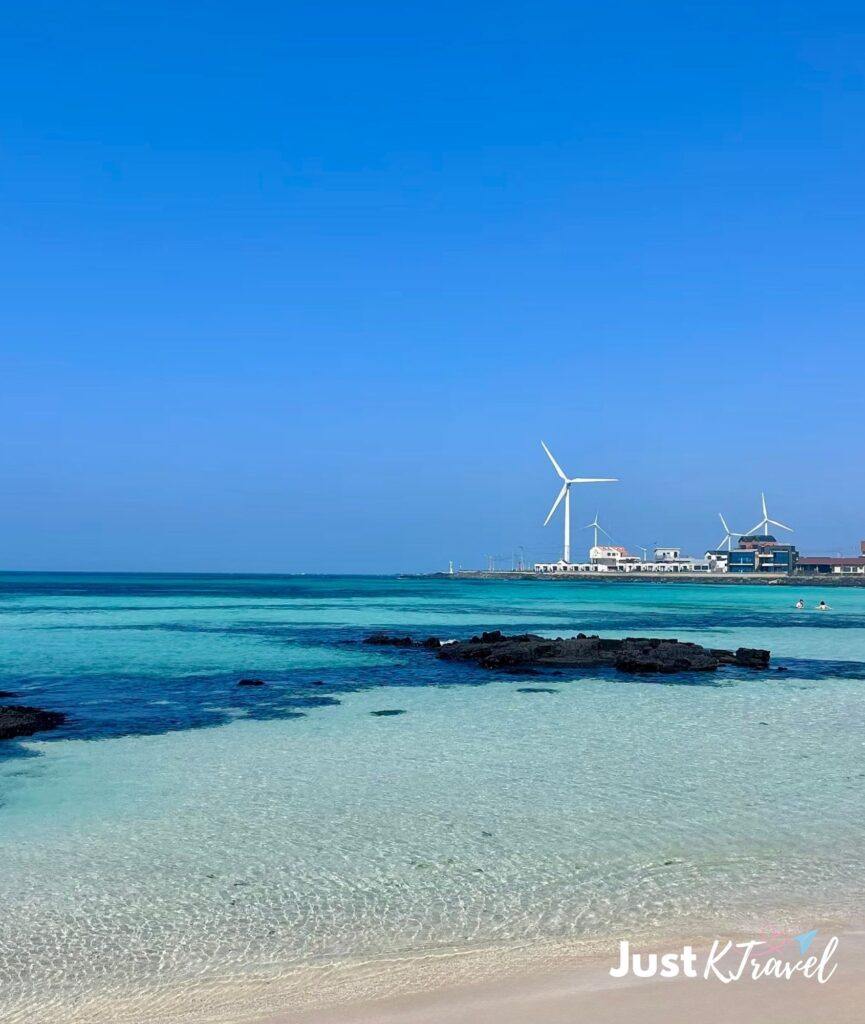 Beautiful turquoise water at Hamdeok Beach in Jeju Island Korea
