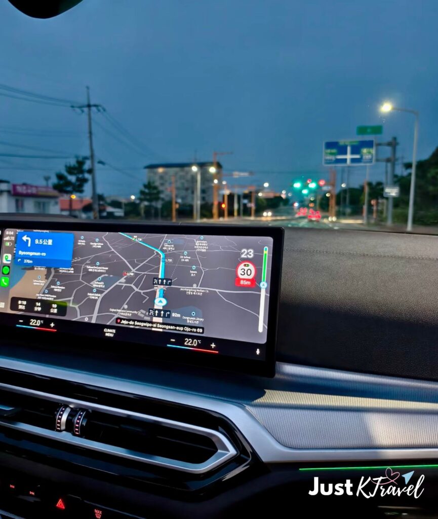 Driving around Jeju Island using navigation during summer