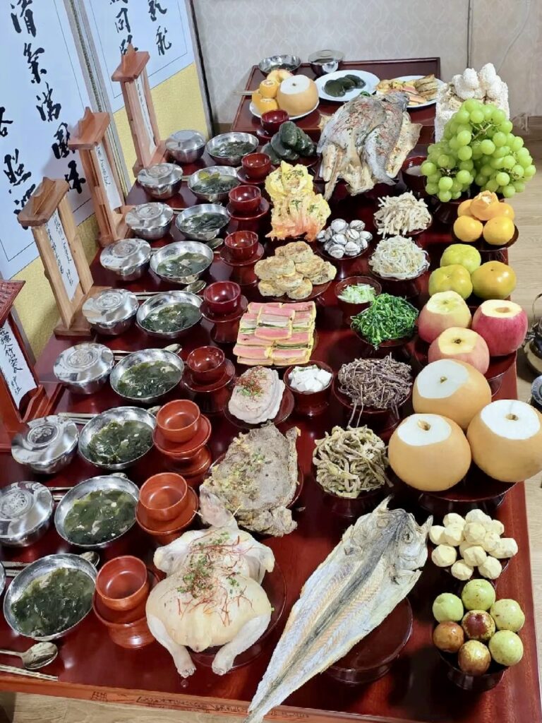 Traditional Chuseok jesa table with Korean food prepared for ancestor memorial ceremony