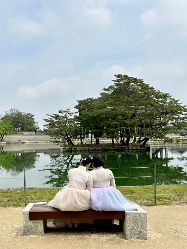 Visitors wearing hanbok inside Gyeongbokgung Palace Seoul Korea
