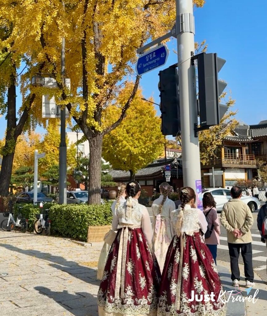 Visitors wearing hanbok during autumn in Seoul, Korea