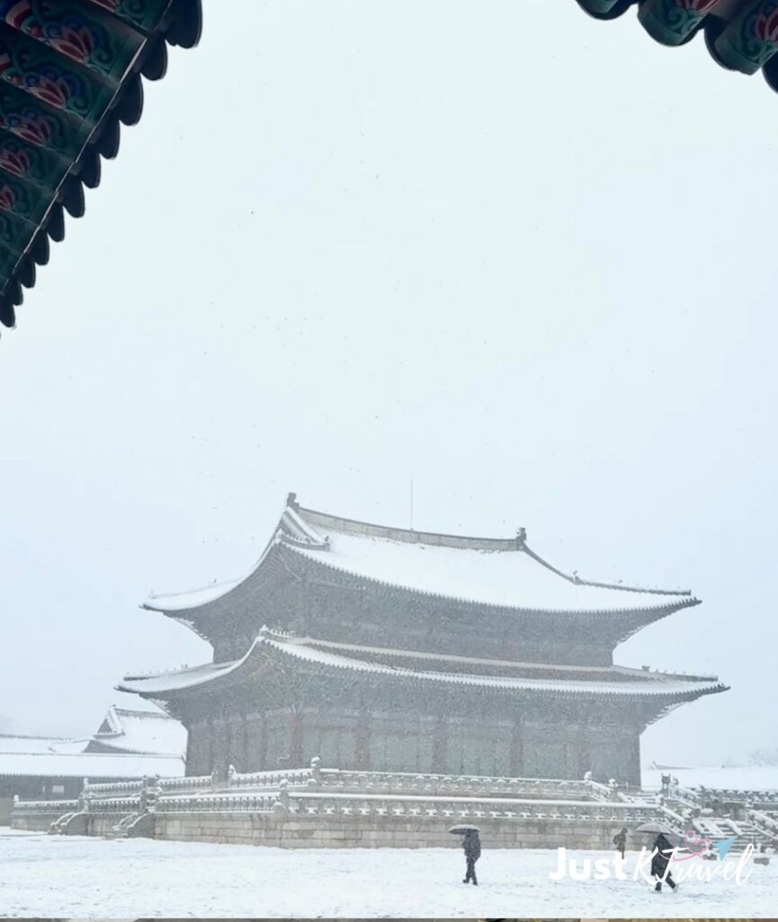 Geunjeongjeon Hall at Gyeongbokgung Palace covered in snow