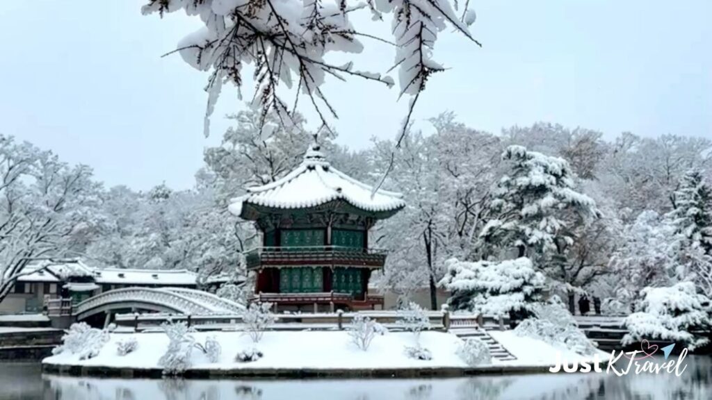 Hyangwonjeong Pavilion at Gyeongbokgung Palace covered in snow