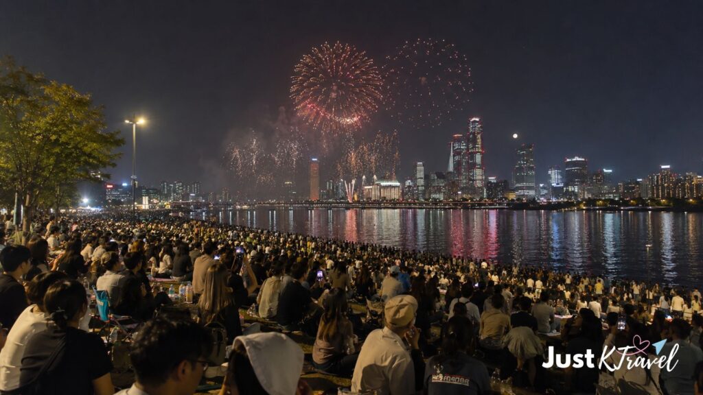 Crowd watching fireworks over the Han River from Ichon Hangang Park