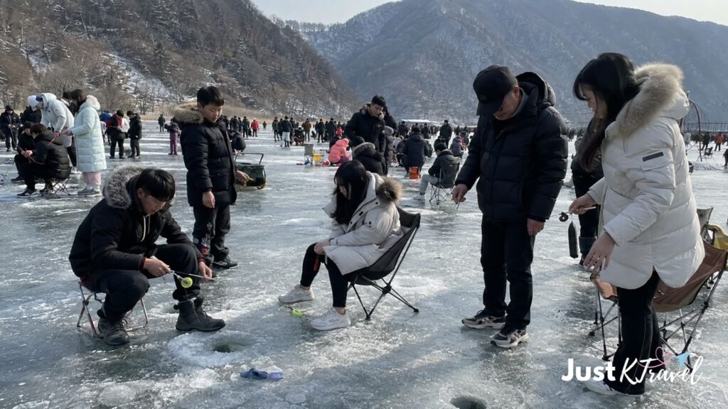 Visitors ice fishing at Pyeongchang Trout Festival in winter