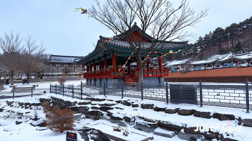 Snow-covered traditional pavilion at Namsangol Hanok Village in Seoul