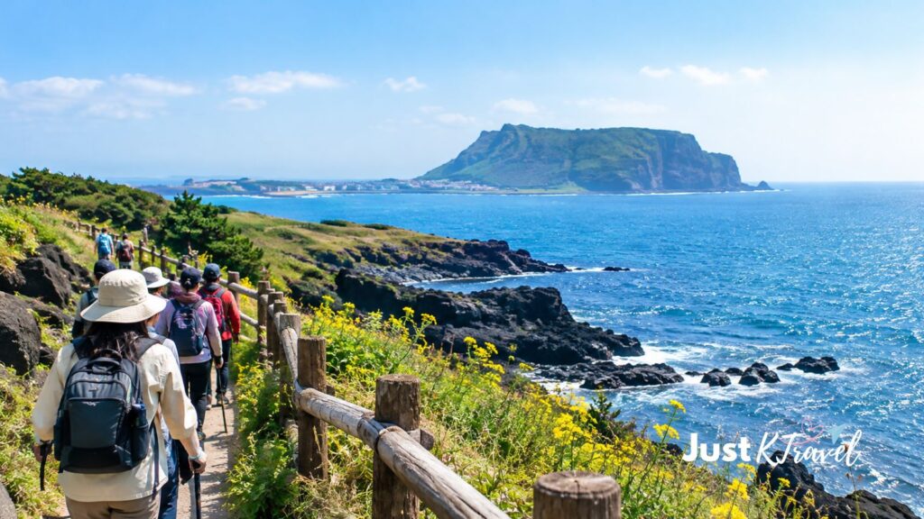 AI-generated illustration of hikers walking along a scenic Jeju Island coastal trail during autumn