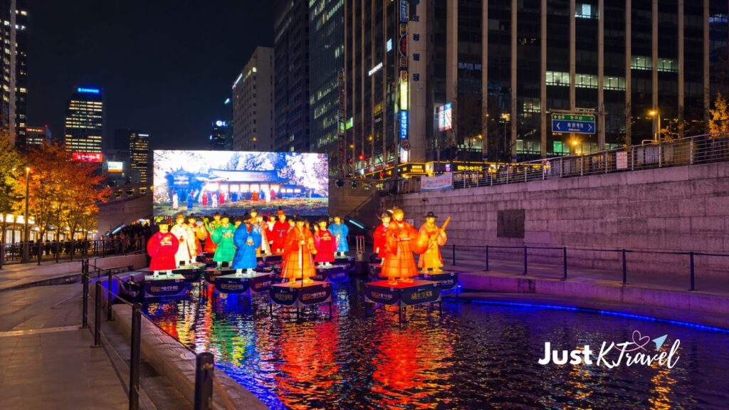 Colorful illuminated lantern displays along Cheonggyecheon Stream during Seoul's winter lantern festival.